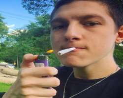 Nathaniel Hall smoking